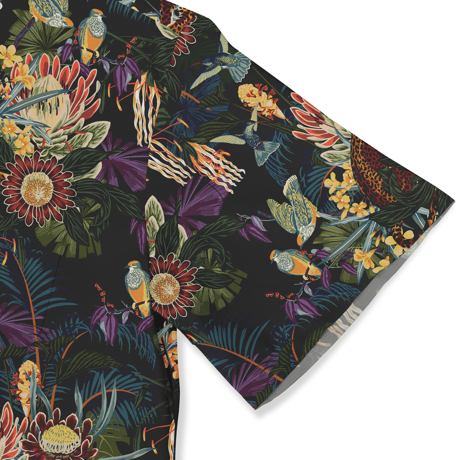 Tropical print shirt with vibrant birds, flowers, and leaves.