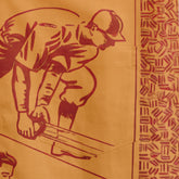 Red and gold textile with a worker figure and geometric patterns.