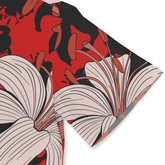 Red, black, and beige floral patterned fabric with bold, stylized.