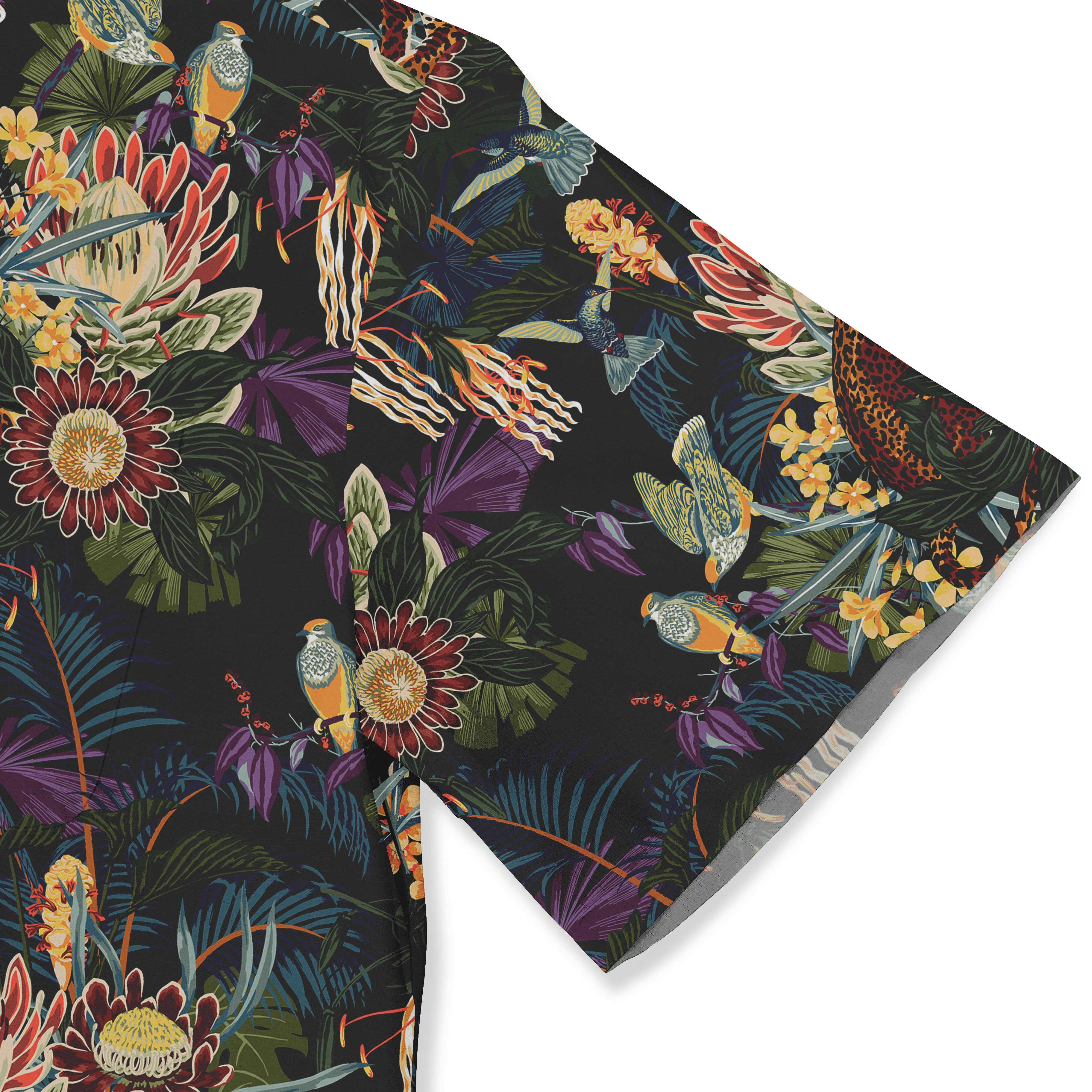 Tropical print shirt with vibrant birds, flowers, and leaves.
