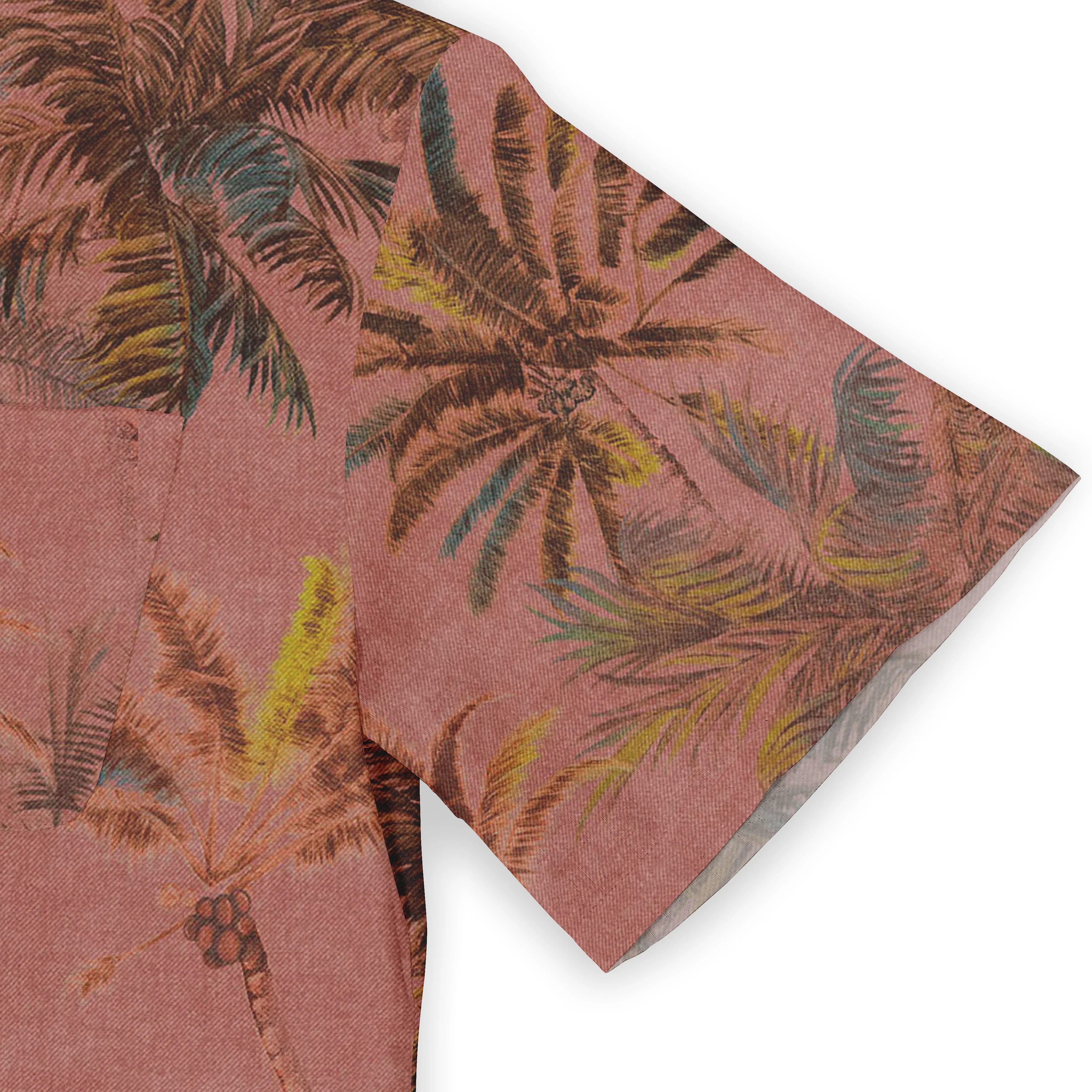 Pink tropical print shirt with palm leaves and coconuts.