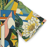 Colorful geometric and floral patterned fabric with vibrant greens.