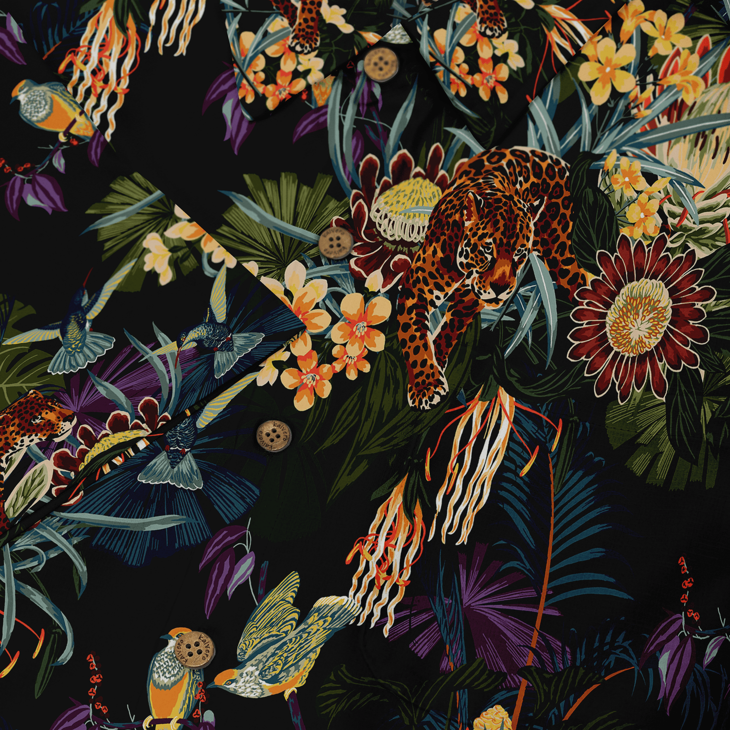 Tropical print shirt with leopards, birds, and vibrant flowers.