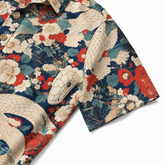 KALVERO Serpent Blossom shirt: short sleeve hem, showing ivory snakes and red flowers on navy.