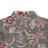 Floral-patterned shirt with vibrant tropical flowers and leaves.