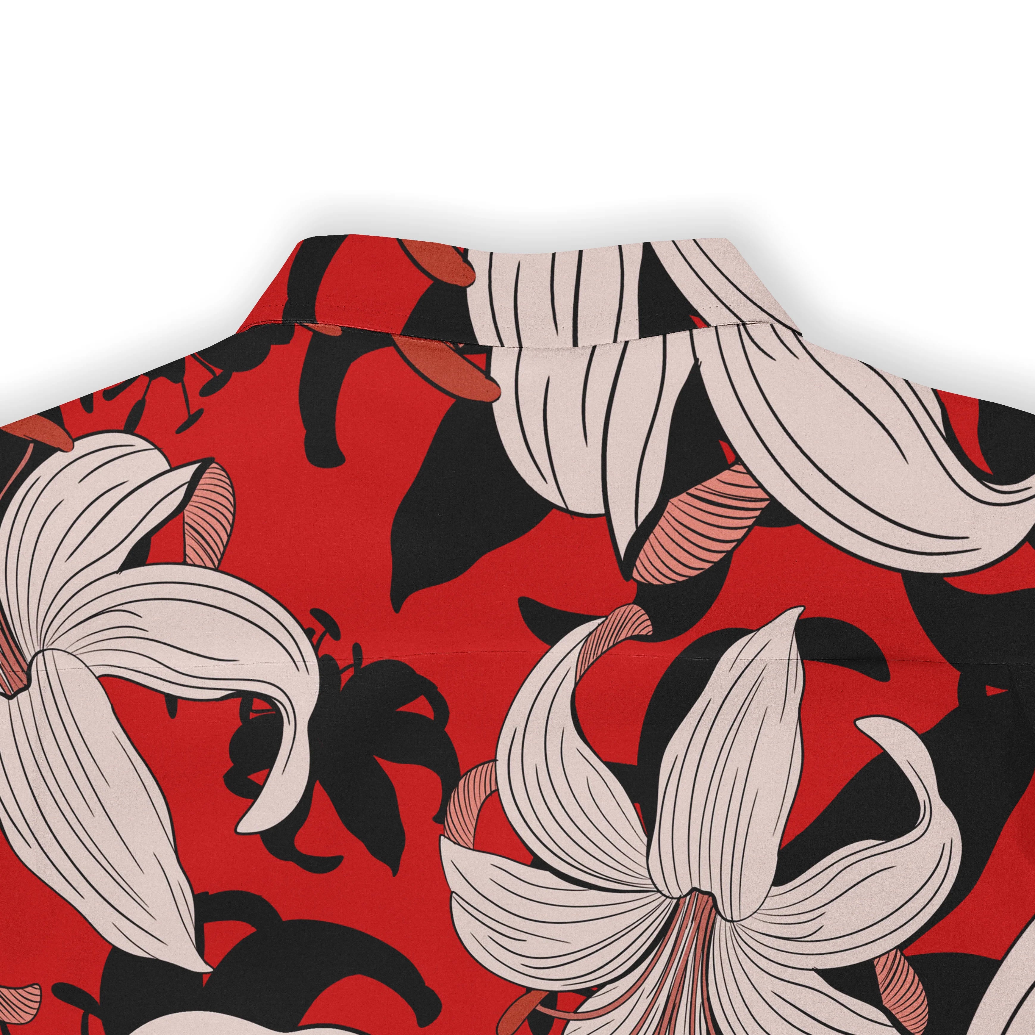 Red shirt with bold floral pattern featuring white and black flowers.