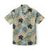 Short-sleeve shirt with black, yellow, and green leaf pattern.