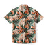 Beige shirt with orange and green tropical leaf pattern.