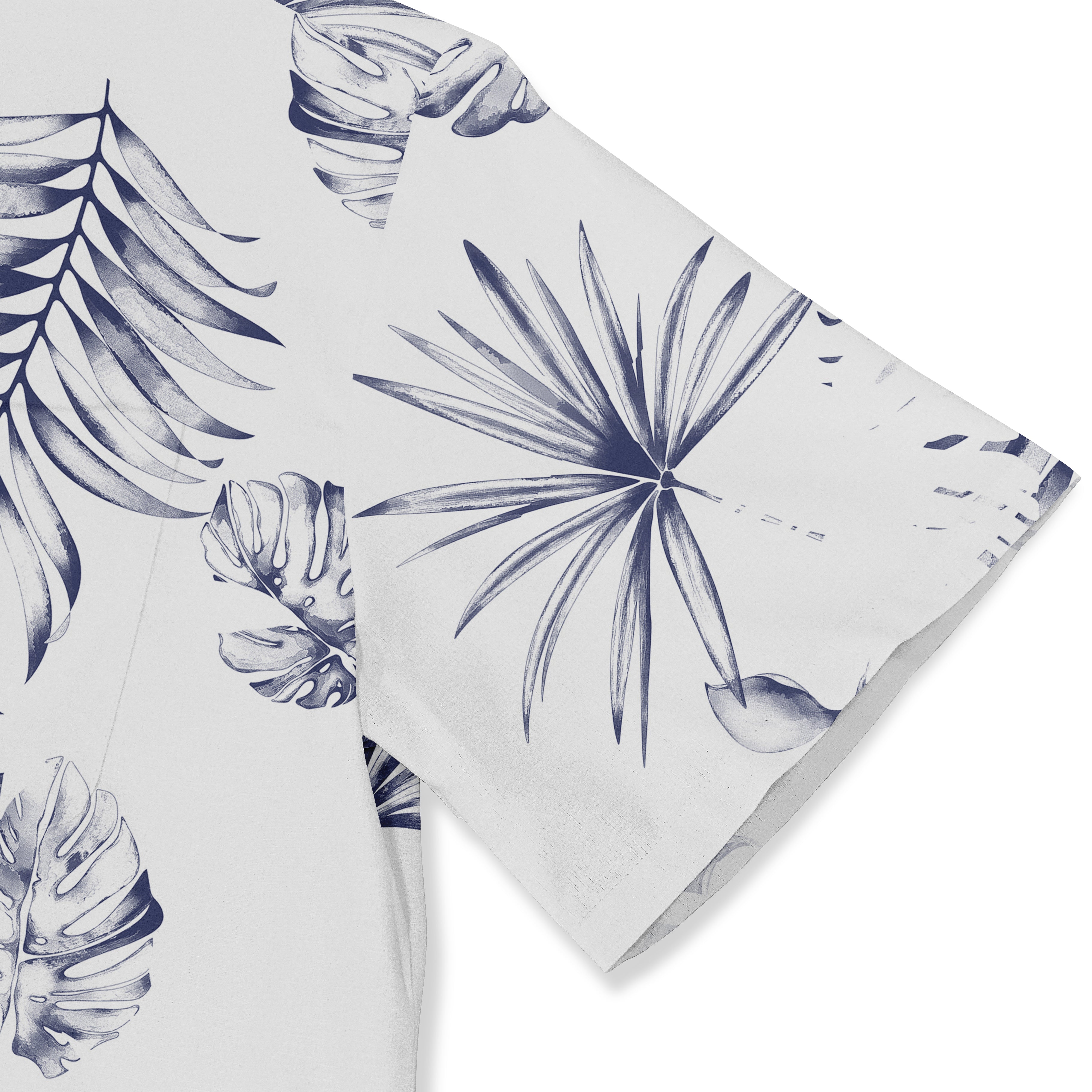 White fabric with navy blue tropical leaf print, featuring monstera.