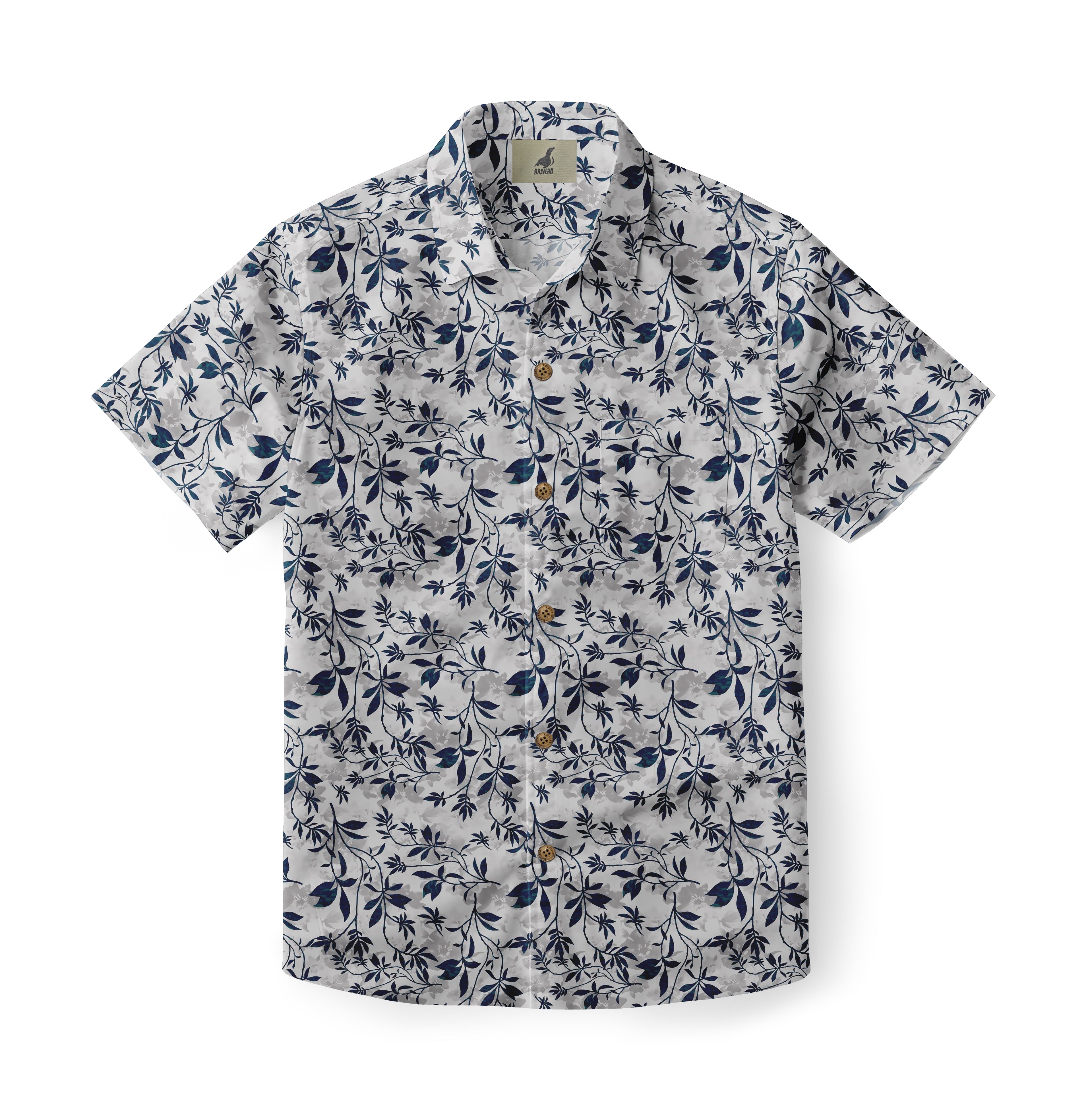White shirt with navy floral pattern, short sleeves, button front.
