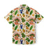 Colorful tropical shirt with parrots, guitars, and fruits.
