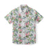 White shirt with pink flowers and green leaves pattern.