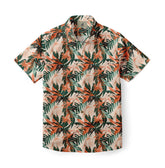 Beige shirt with orange and green tropical leaf print.