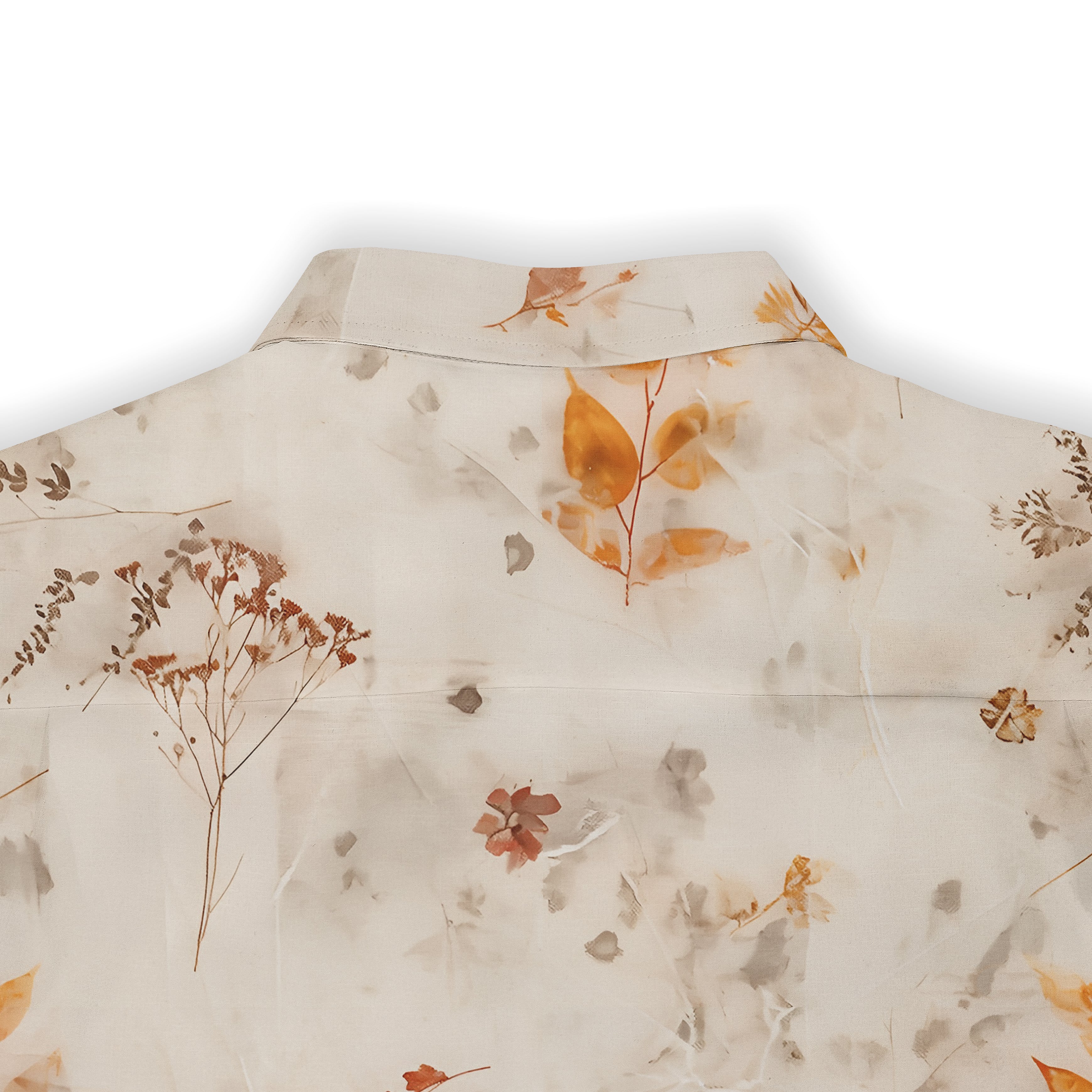 Beige shirt with autumnal floral print, featuring dried leaves.