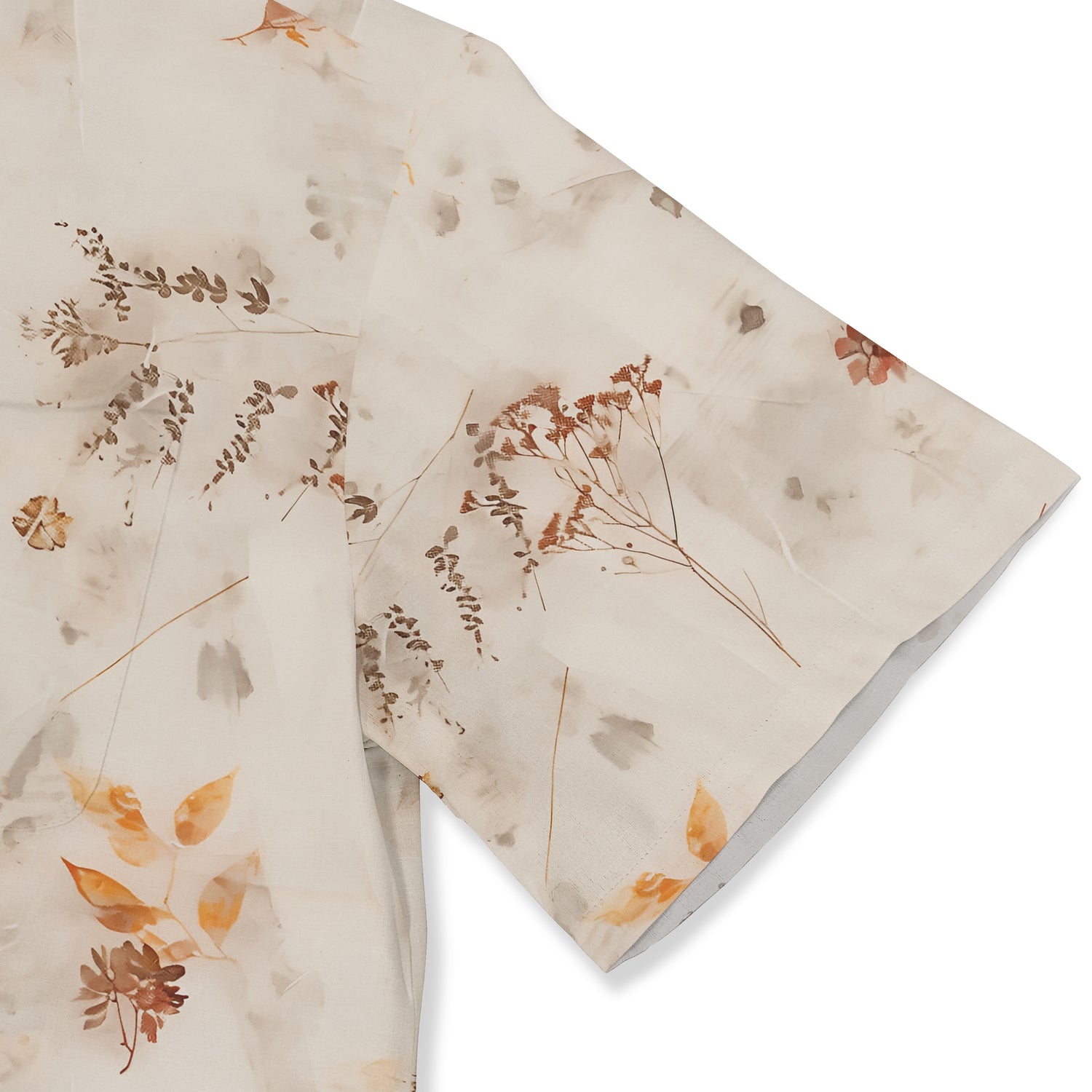 Elegant beige fabric with delicate botanical prints in earthy tones.