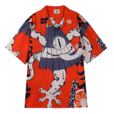 Orange shirt with blue and white abstract design.