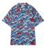 Blue shirt with red koi fish and wave patterns.
