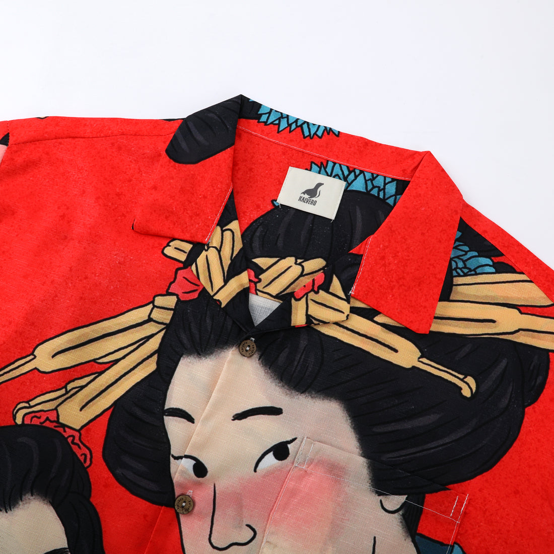 Red shirt with black hair, wooden sticks design.
