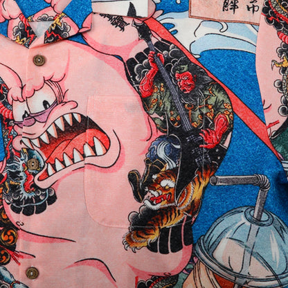 Colorful shirt with cartoon and traditional art designs.