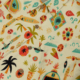 Colorful tropical print shirt with palm trees and surfboards.
