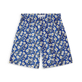 A pair of shorts featuring a design with white and yellow flowers on a vibrant blue background, creating a cheerful and lively look.