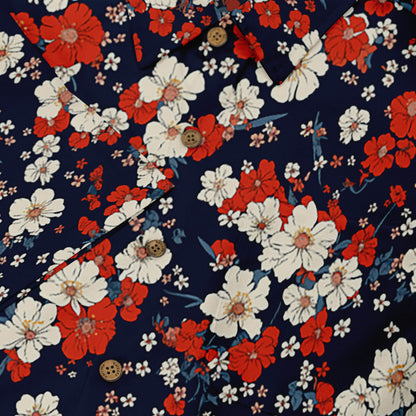 Vibrant red and white blooms on a stylish navy shirt.