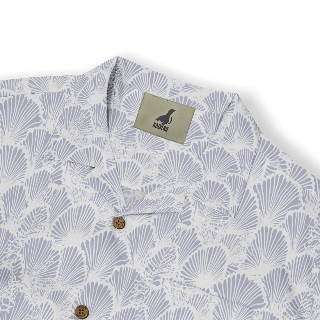 Light blue and white shell-patterned shirt with wooden buttons.