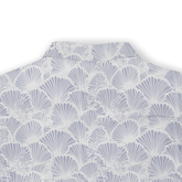 Light blue and white shell-patterned shirt with a high collar.