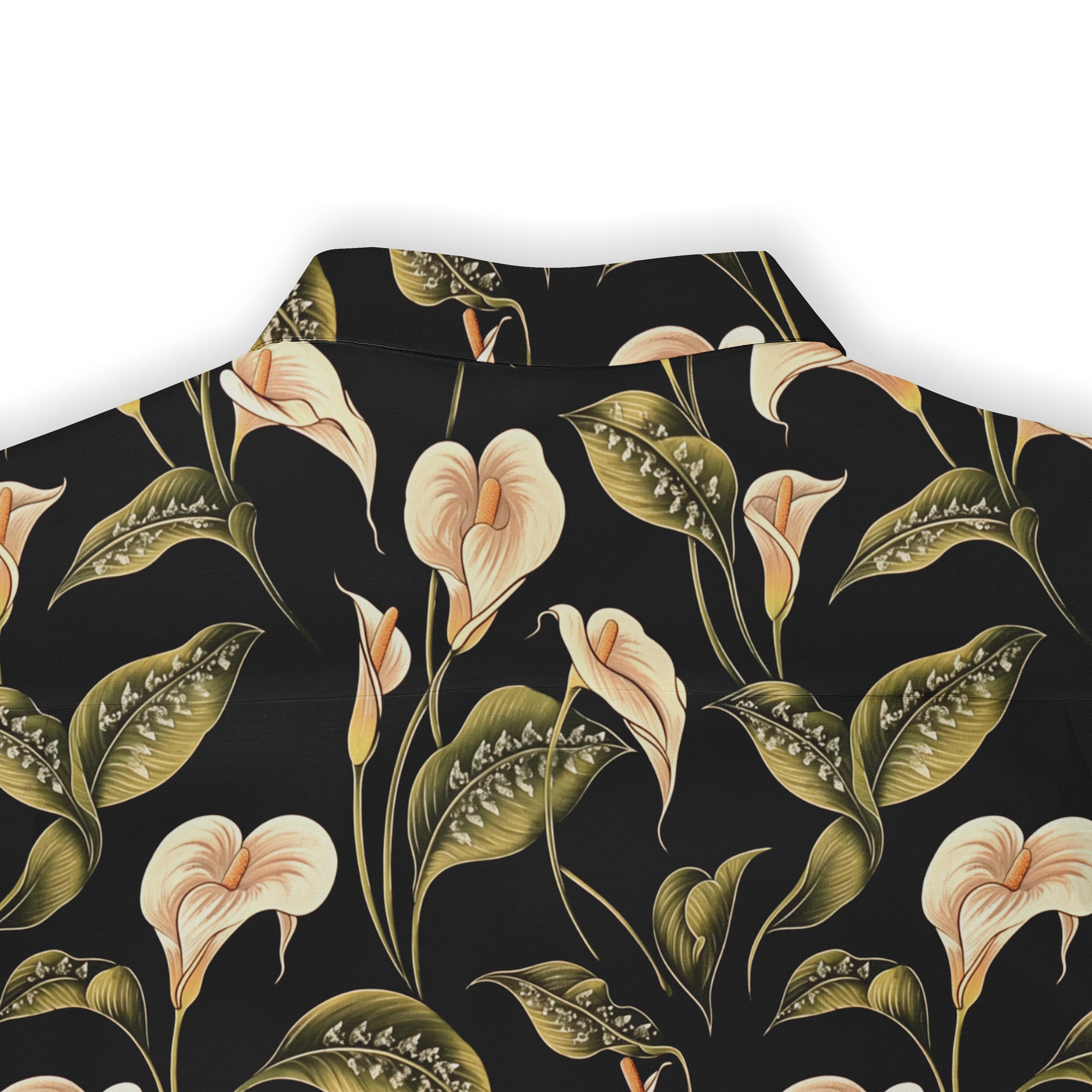 Nature-inspired shirt showcasing white calla lilies against a dark backdrop.