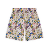 A pair of shorts featuring a vibrant array of flowers in various colors, creating a lively and intricate floral pattern.