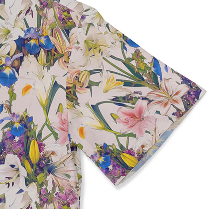 Detail of a floral pattern showcasing lilies and irises on a stylish shirt.