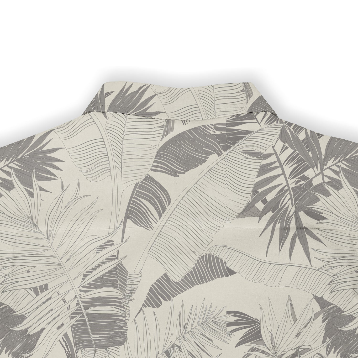 Beige shirt with gray tropical leaf pattern.