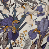 Floral shirt with purple and white flowers, brown buttons.
