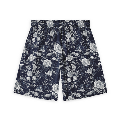 A pair of shorts featuring intricate white and light-colored flowers on a dark blue background, creating a sophisticated and timeless floral pattern.