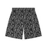 A pair of shorts featuring a design with intricate silver leaves gracefully arranged on a black background, creating a sophisticated and elegant pattern.