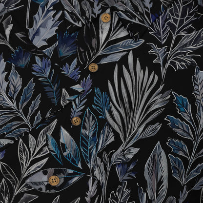 Intricate silver and blue leaves on a black shirt