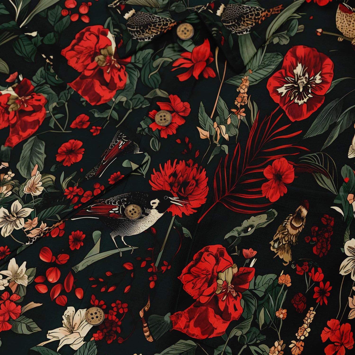 Dark fabric with red flowers, birds, and leaves pattern.