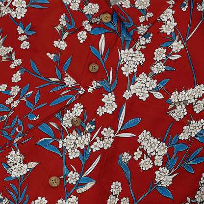 Stylish red shirt with a harmonious floral design.