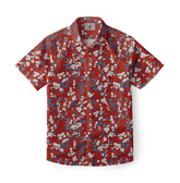  Red floral shirt with white blossoms and blue leaves.