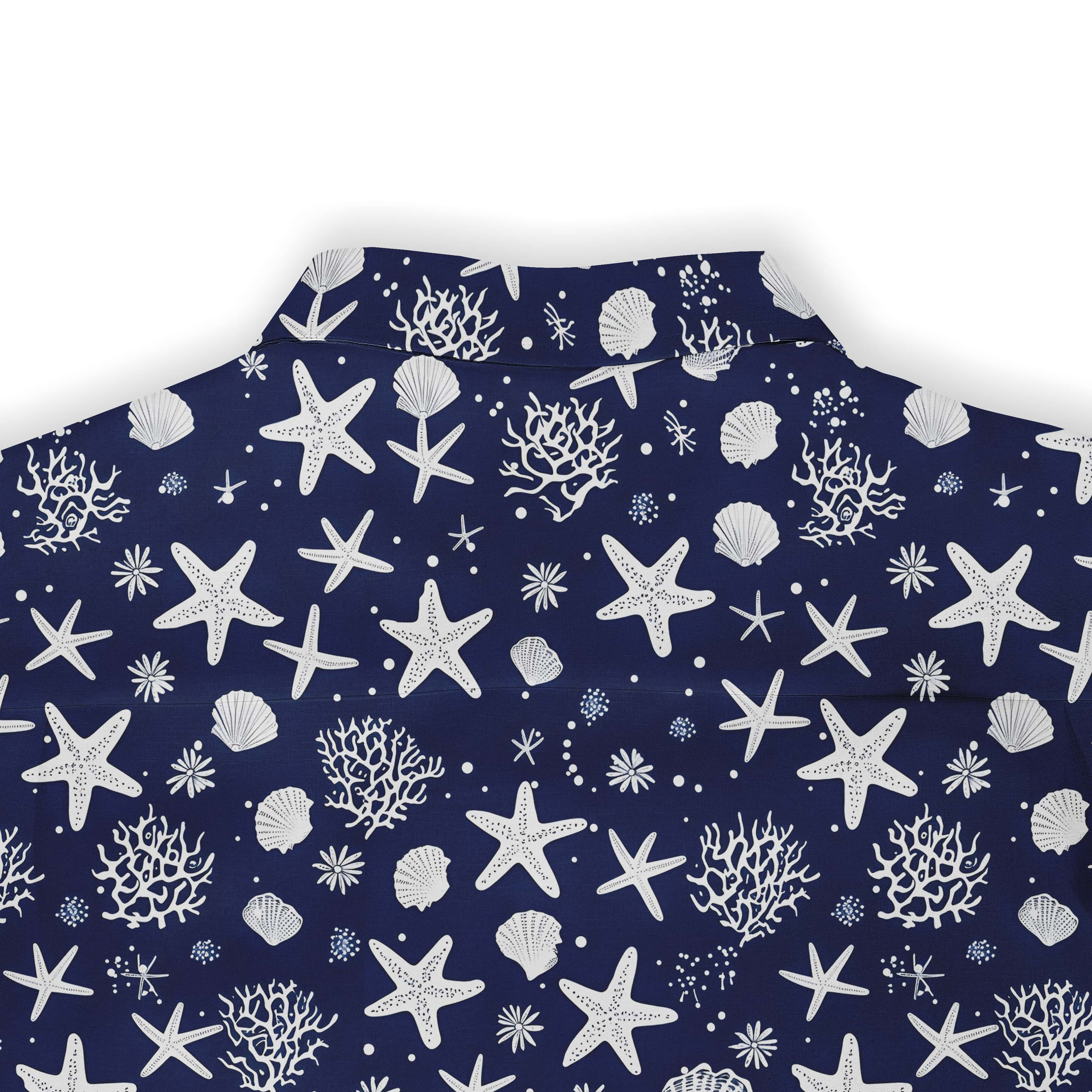 Marine-inspired pattern on a navy Hawaiian shirt by Kalvero, highlighting starfish and coral.