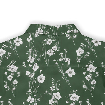 Green shirt with white floral print.