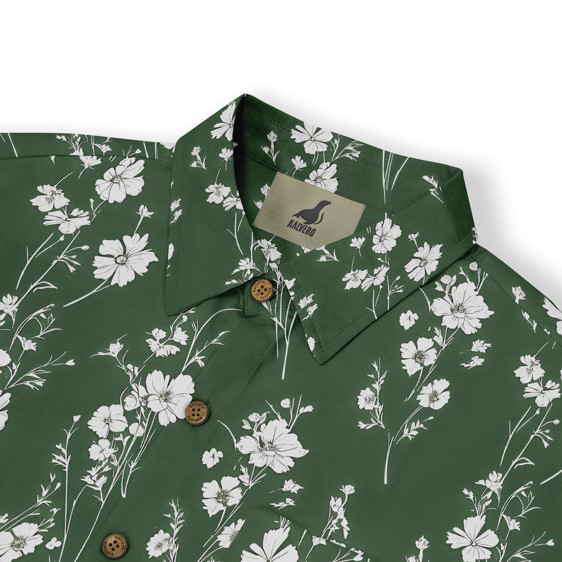 Green shirt with white floral pattern and logo tag.