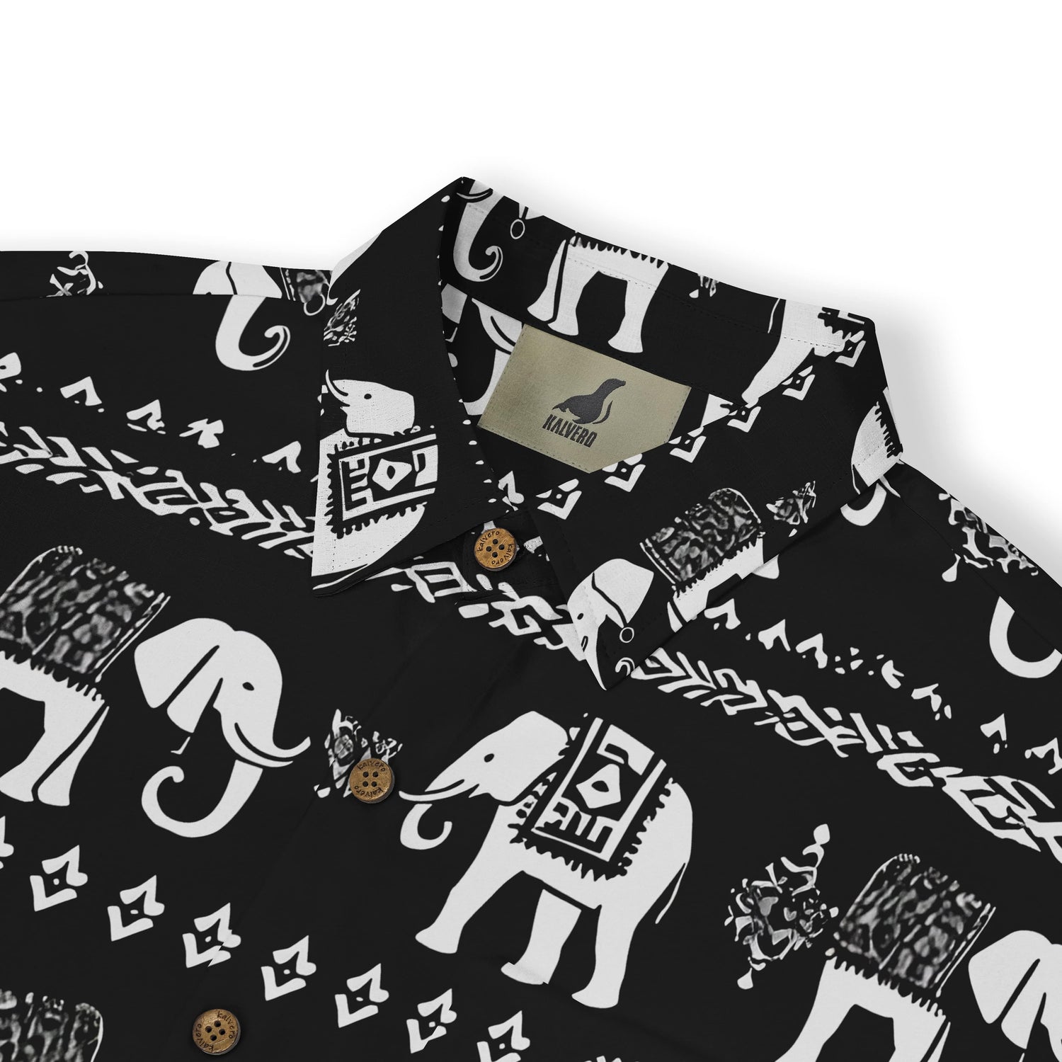 Detailed view of a tribal elephant design on a short-sleeve shirt.