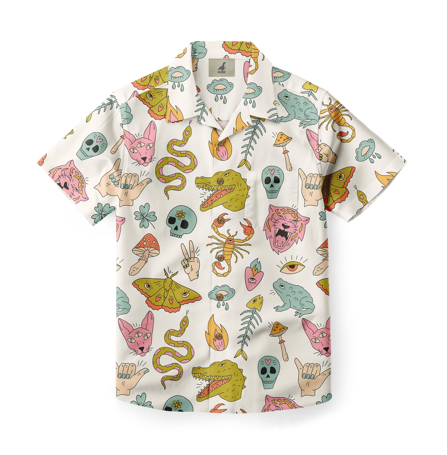 White shirt with colorful cats, skulls, frogs, and mushrooms pattern.