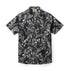 Black short-sleeve shirt with gray tropical leaf pattern.