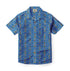 Blue short-sleeve shirt with colorful geometric patterns.