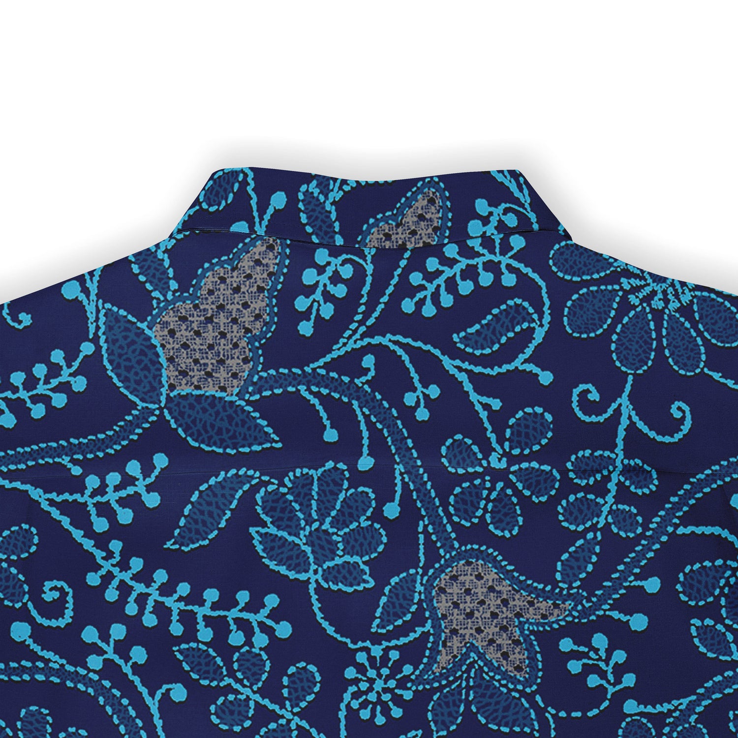 Close-up of the back collar of a navy shirt featuring light blue floral and vine patterns.