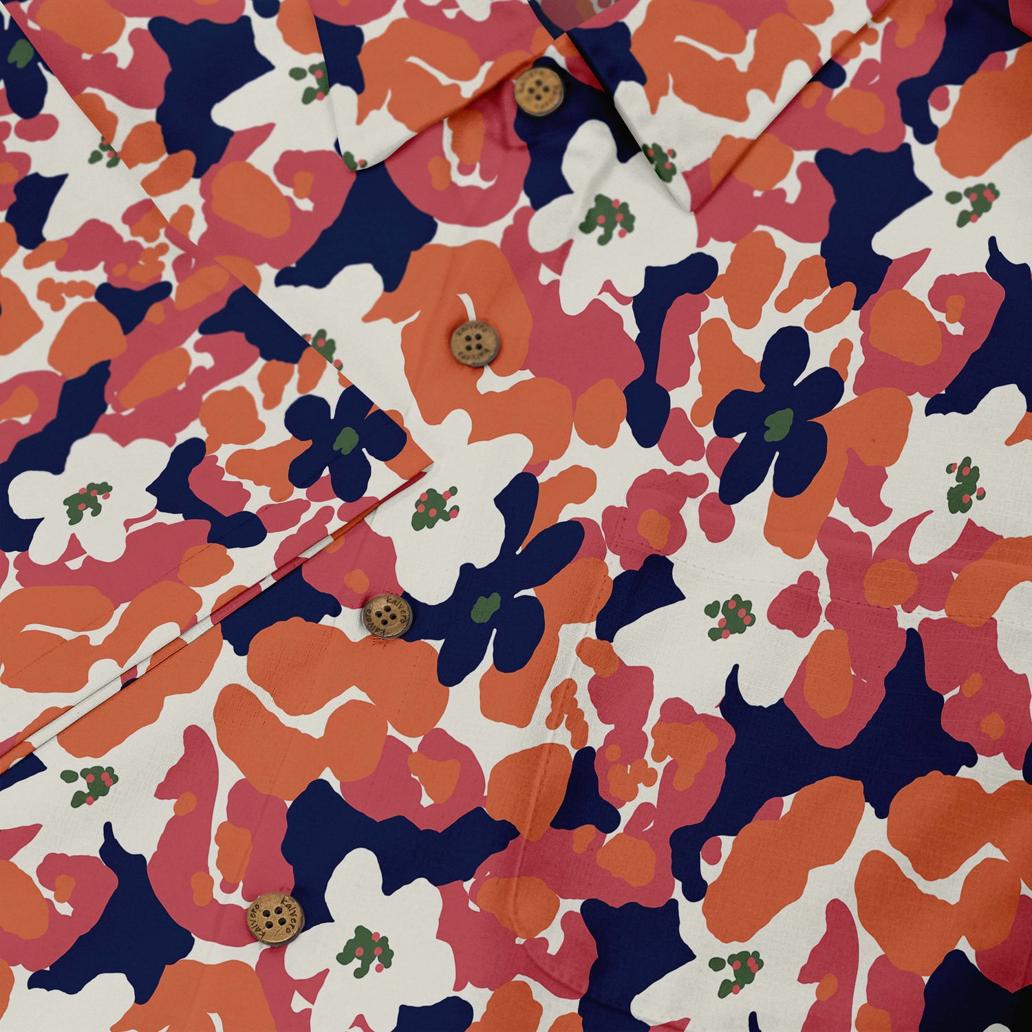 Orange and red shirt with bold floral patterns, radiating energy and confidence close-up