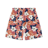 Orange and red short with bold floral patterns, radiating energy and confidence.