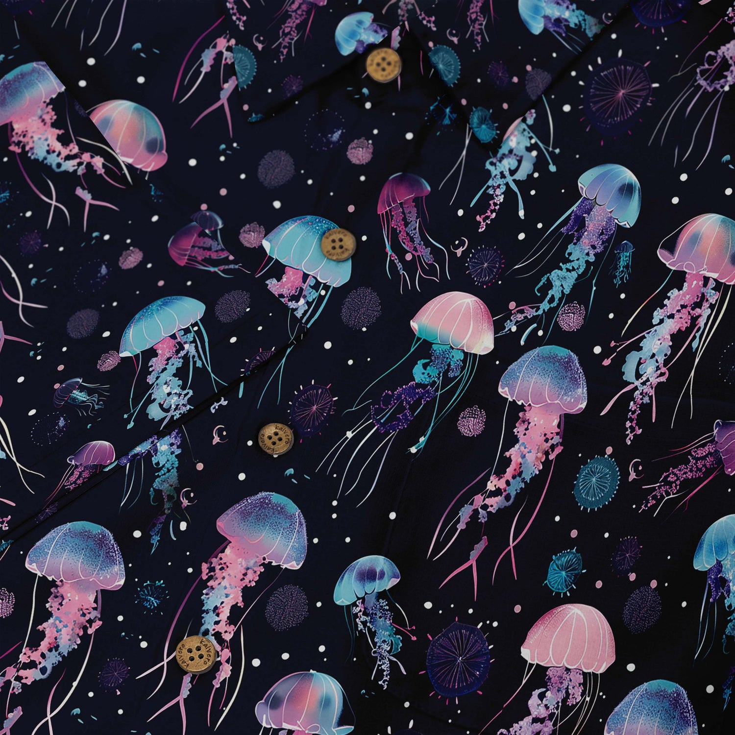 Shirt featuring a design of bioluminescent jellyfish against a dark, starry background front buttons close-up